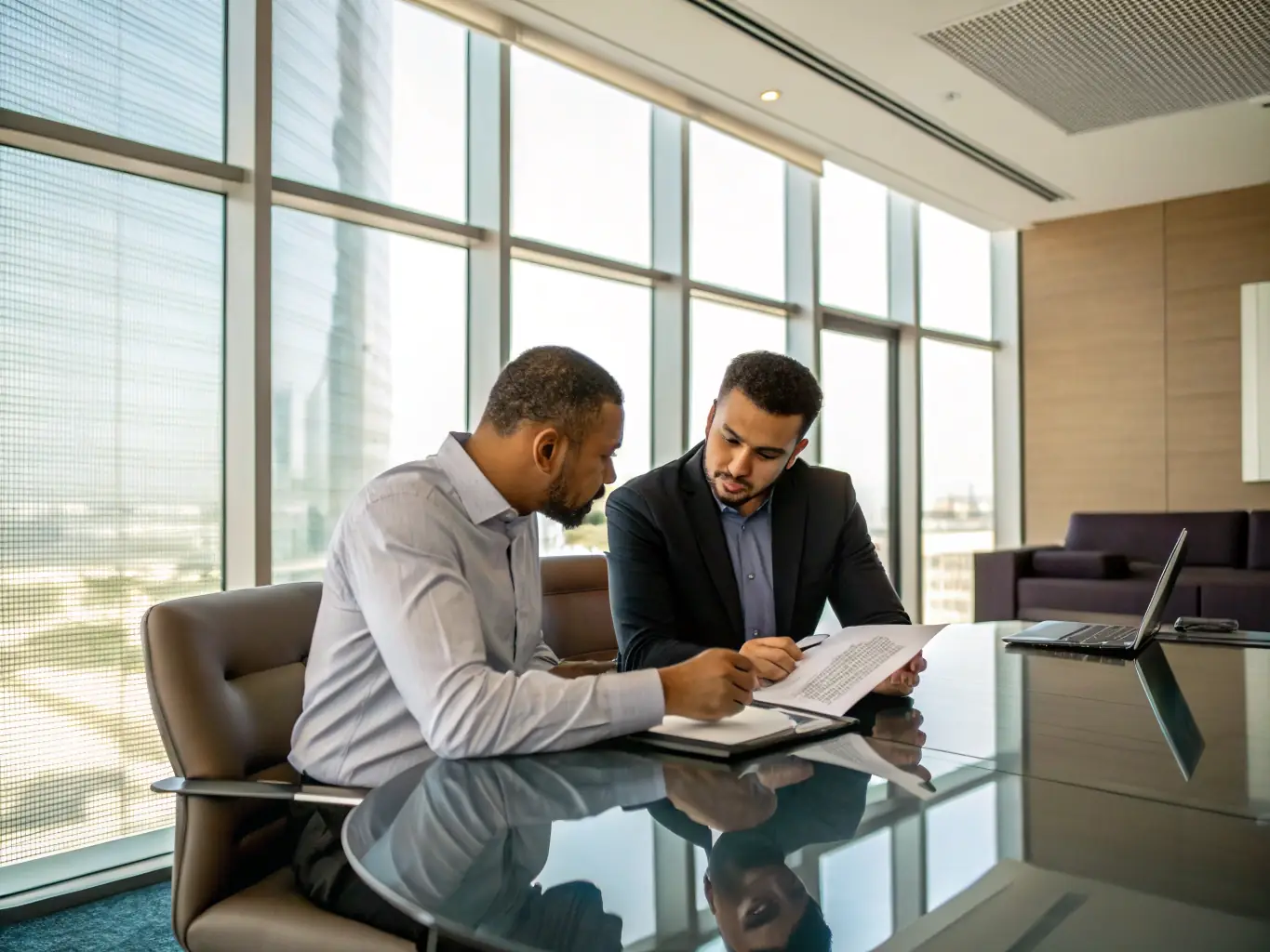A professional consultant reviewing vehicle export documents with a client, with a backdrop of international shipping containers, symbolizing Stelarity LLC's expertise in vehicle export assistance.