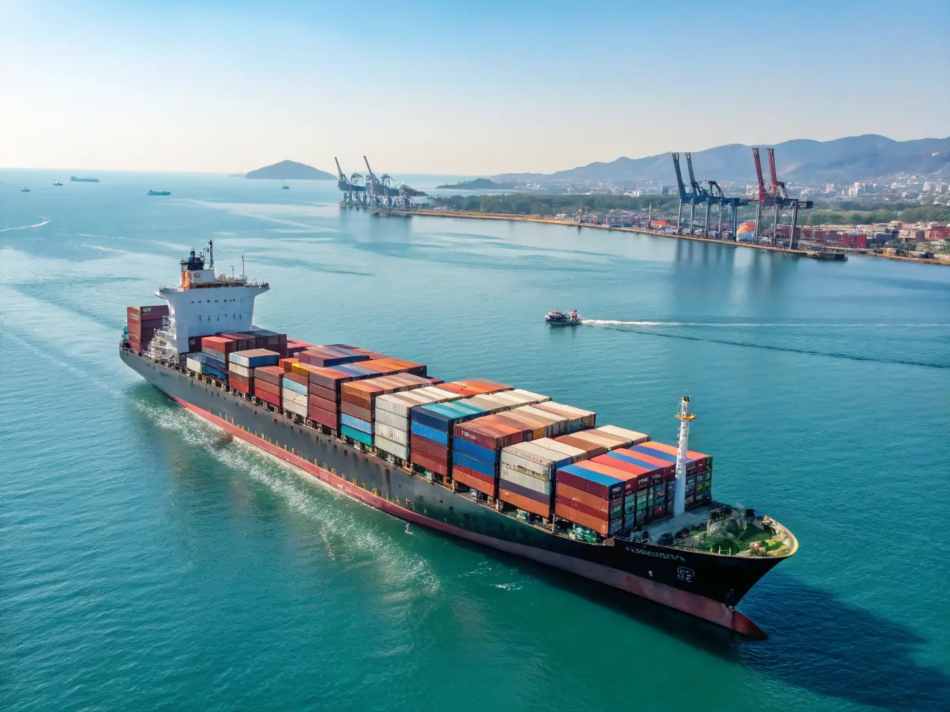 A modern vehicle carrier ship sailing on a clear day, representing Stelarity LLC's vehicle export assistance services.